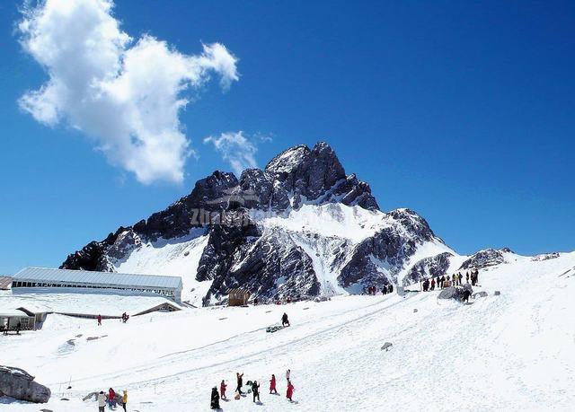 Visitors Playing at the Jade Dragon Snow Mountain 