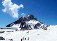 Visitors Playing at the Jade Dragon Snow Mountain 