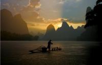 Guilin Li River and Fishermen with His Bamboo Raft