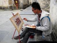 A Man Sketching at Xidi Village Huangshan City